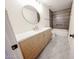 Bathroom featuring modern vanity and shower with gray tiled surround at 6228 E Blanche Dr, Scottsdale, AZ 85254