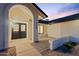Inviting entryway with double doors, brick-paved courtyard, and xeriscaped front yard at 6228 E Blanche Dr, Scottsdale, AZ 85254