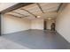 Spacious two-car garage with painted floors and ample storage at 6228 E Blanche Dr, Scottsdale, AZ 85254