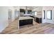 Bright, open kitchen showcasing dark cabinets, stainless appliances, and a center island at 6228 E Blanche Dr, Scottsdale, AZ 85254
