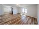 Spacious living room featuring hardwood floors and a modern lighting fixture at 6228 E Blanche Dr, Scottsdale, AZ 85254
