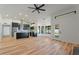 Open-concept living space with wood floors, chef's kitchen, and natural light at 6228 E Blanche Dr, Scottsdale, AZ 85254