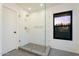 Glass-enclosed shower with unique tile design and rainfall showerhead at 6228 E Blanche Dr, Scottsdale, AZ 85254
