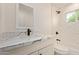 Elegant bathroom showcasing marble countertops and modern black fixtures at 6733 N 49Th Ave, Glendale, AZ 85301