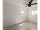 A bedroom featuring a ceiling fan and a bright view from the dual windows at 6733 N 49Th Ave, Glendale, AZ 85301