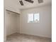 Bedroom featuring a closet and a window for natural light at 6733 N 49Th Ave, Glendale, AZ 85301