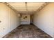 Spacious garage with ample storage space, workbench, and concrete flooring at 6733 N 49Th Ave, Glendale, AZ 85301