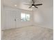 Bright living room featuring tile floors, a ceiling fan and a front door at 6733 N 49Th Ave, Glendale, AZ 85301