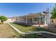 Covered patio in backyard with shed, exterior features, and space for outdoor enjoyment at 7214 W Columbine Dr, Peoria, AZ 85381