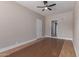 Bedroom with ceiling fan, and access to other rooms for convenience at 7214 W Columbine Dr, Peoria, AZ 85381