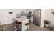 Well-designed kitchen featuring a kitchen island, stainless steel appliances, and barstool seating at 7300 E Earll Dr # 1022, Scottsdale, AZ 85251