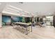 Modern lounge area with a long table, comfortable seating, and stylish decor creating a welcoming atmosphere at 7300 E Earll Dr # 1022, Scottsdale, AZ 85251