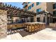 A fully equipped outdoor kitchen and bar area for entertaining guests at 7300 E Earll Dr # 1022, Scottsdale, AZ 85251