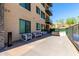Outdoor patio with comfortable seating and a cozy fire pit at 7300 E Earll Dr # 1022, Scottsdale, AZ 85251