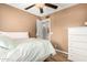 Cozy bedroom features hardwood floors and a closet at 7515 W Sweetwater Ave, Peoria, AZ 85381