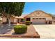 Charming single-Gathering home featuring a well-manicured front yard and a two-car garage at 7515 W Sweetwater Ave, Peoria, AZ 85381