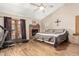 The main bedroom includes a fireplace, French doors, and hard wood floors at 7515 W Sweetwater Ave, Peoria, AZ 85381