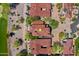 Aerial view of a home's red tiled roof surrounded by desert landscaping and close to the golf course at 7780 E Golden Eagle Cir, Gold Canyon, AZ 85118