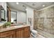 Bathroom features a vanity with marble countertop and glass enclosed tiled shower at 7780 E Golden Eagle Cir, Gold Canyon, AZ 85118