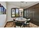 Cozy breakfast nook with natural light, a view of the golf course, and custom cabinetry at 7780 E Golden Eagle Cir, Gold Canyon, AZ 85118