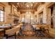 Well-appointed dining room in Superstition Mountain Golf and Country Club with seating for large parties at 7780 E Golden Eagle Cir, Gold Canyon, AZ 85118