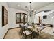 Formal dining room with chandelier and ample seating at 7780 E Golden Eagle Cir, Gold Canyon, AZ 85118