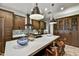 Spacious kitchen island featuring pendant lighting and barstool seating at 7780 E Golden Eagle Cir, Gold Canyon, AZ 85118