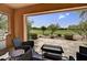 Relaxing outdoor patio featuring comfortable seating and a picturesque view of the golf course at 7780 E Golden Eagle Cir, Gold Canyon, AZ 85118