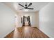 This bedroom features neutral walls, wood floors and a large window at 7813 N 17Th Dr, Phoenix, AZ 85021