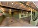 Covered front porch with ambient lighting, offering an inviting outdoor living space at 7813 N 17Th Dr, Phoenix, AZ 85021
