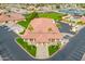 Aerial view of a recreation building with a red tile roof, parking lot, and landscaped grounds at 8037 E Navarro Ave, Mesa, AZ 85209