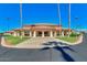 Beautiful community center with lush landscaping, spacious parking, and inviting entrance at 8037 E Navarro Ave, Mesa, AZ 85209