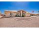 Inviting front yard with desert landscaping and charming curb appeal on a sunny day at 8037 E Navarro Ave, Mesa, AZ 85209