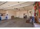 Spacious garage with ample storage and work space at 8037 E Navarro Ave, Mesa, AZ 85209