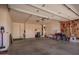 Spacious garage with ample storage and work space at 8037 E Navarro Ave, Mesa, AZ 85209