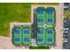 Aerial view of pickleball courts highlights the recreational amenities and community engagement of the neighborhood at 8037 E Navarro Ave, Mesa, AZ 85209