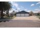 Single-story home featuring a three-car garage at 8310 N 49Th Ave, Glendale, AZ 85302