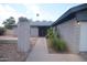 Single-story brick home with covered entry and desert landscaping at 8310 N 49Th Ave, Glendale, AZ 85302