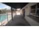 Covered patio overlooks backyard pool area with white fence at 8310 N 49Th Ave, Glendale, AZ 85302
