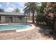 Backyard pool with desert landscaping and privacy fence at 8310 N 49Th Ave, Glendale, AZ 85302