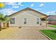 Exterior view of the home's backyard showing the gravel and small patches of grass at 8335 W Pershing Ave, Peoria, AZ 85381