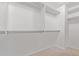 Closet with racks for hanging clothes and neutral carpet at 852 E Mountain View Rd # 18, San Tan Valley, AZ 85143