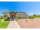 Well-maintained community center with desert landscaping, sidewalk, and covered entrance at 852 E Mountain View Rd # 18, San Tan Valley, AZ 85143