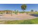 Community fitness area and pavilion, offering exercise equipment and a picnic area in a well-maintained community space at 852 E Mountain View Rd # 18, San Tan Valley, AZ 85143