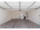 Spacious garage with room for storage, water heater, water softener, and refrigerator at 852 E Mountain View Rd # 18, San Tan Valley, AZ 85143