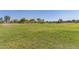 Vast community lawn and soccer field, perfect for games and outdoor activities, surrounded by well-kept greenery at 852 E Mountain View Rd # 18, San Tan Valley, AZ 85143