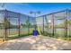 Community tennis courts fenced-in for privacy and equipped with lighting for evening play at 852 E Mountain View Rd # 18, San Tan Valley, AZ 85143