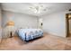 Spacious bedroom features a fan, carpet flooring and a large closet with ample storage at 858 S Portland --, Mesa, AZ 85206