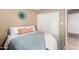 Bright bedroom featuring a ceiling fan, large closet and decorative wall art at 945 N Pasadena -- # 62, Mesa, AZ 85201