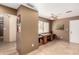 Neutral living room with desk area, tile floors, and ceiling fan at 945 N Pasadena -- # 62, Mesa, AZ 85201